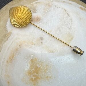 Trifari vintage gold-tone seashell stick pin.